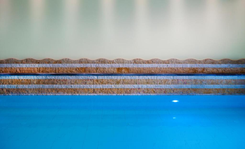 Bazén v ubytování Hotel Baia Verde nebo v jeho okolí