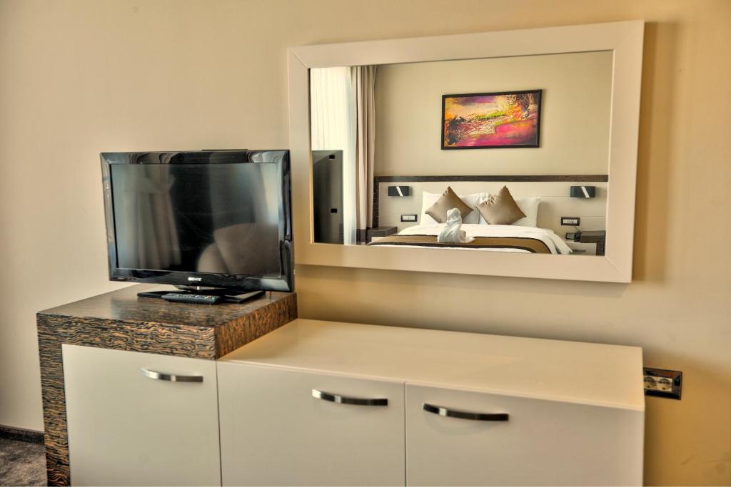 Kuchyň nebo kuchyňský kout v ubytování Amazona Hotel