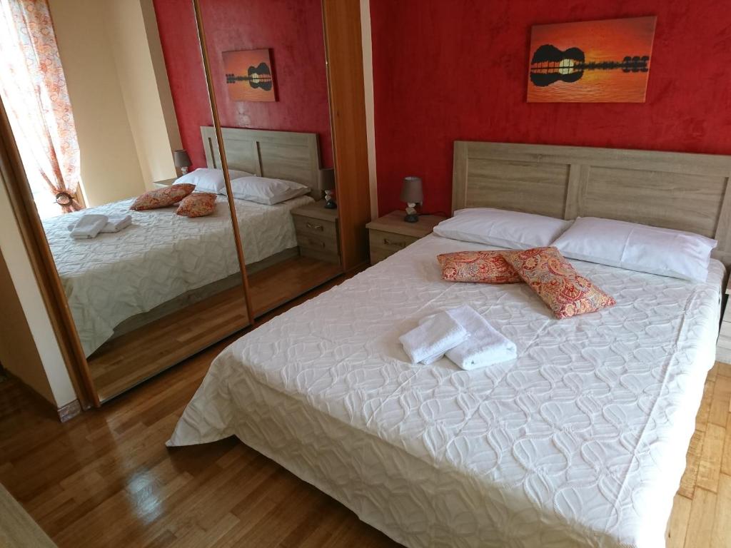 Posteľ alebo postele v izbe v ubytovaní Marianas Inn