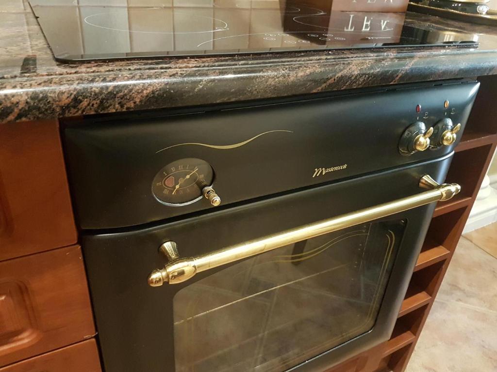 Kuchyňa alebo kuchynka v ubytovaní GoldStar Luxury Old Town Krakow Apartment