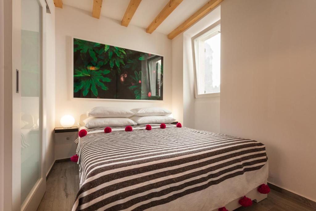 Letto o letti in una camera di Apartments Stube 4