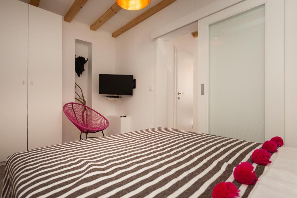 TV o dispositivi per l'intrattenimento presso Apartments Stube 4