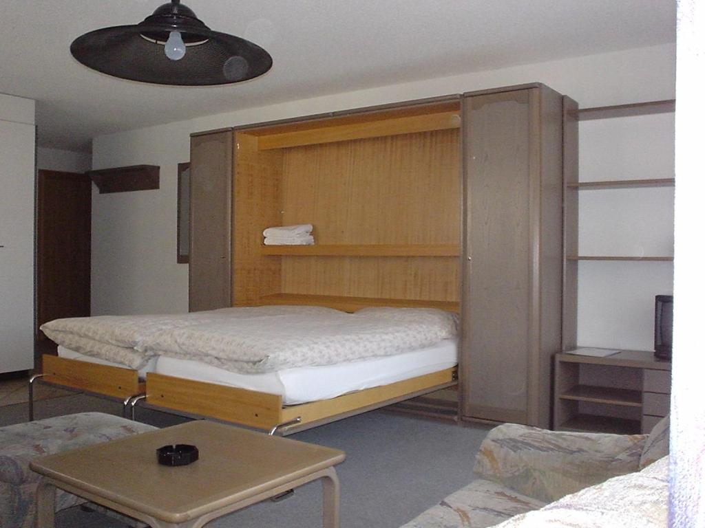 Postel nebo postele na pokoji v ubytování St Martin Apartments