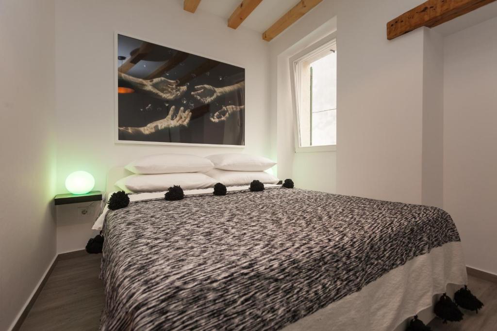 Letto o letti in una camera di Apartments Stube 4