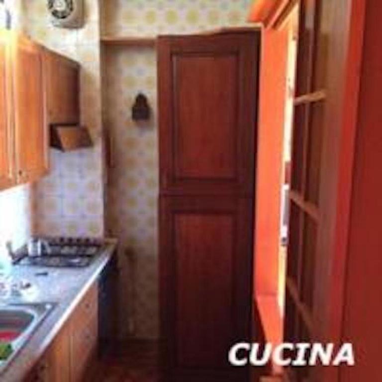 Kuchyň nebo kuchyňský kout v ubytování RESIDENCE ALTAIR Via Roma 13