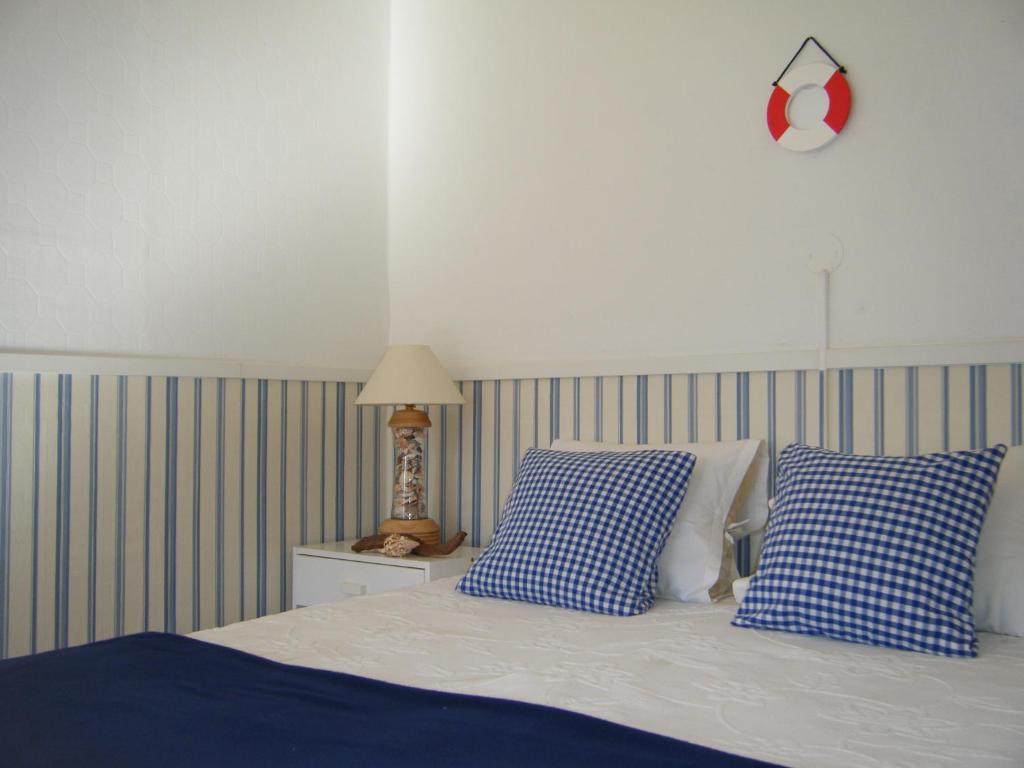 Postel nebo postele na pokoji v ubytování Kaju Guesthouses