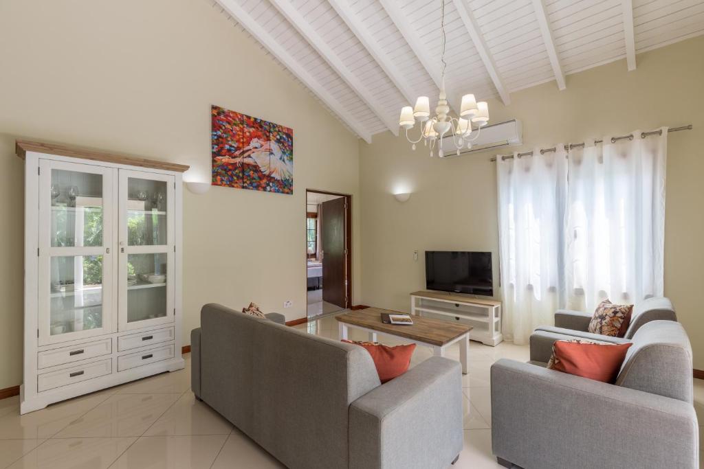 TV a/nebo společenská místnost v ubytování Acoya Curacao Resort, Villas & Spa