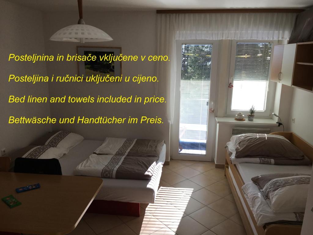 Postel nebo postele na pokoji v ubytování Apartment Gaber 82