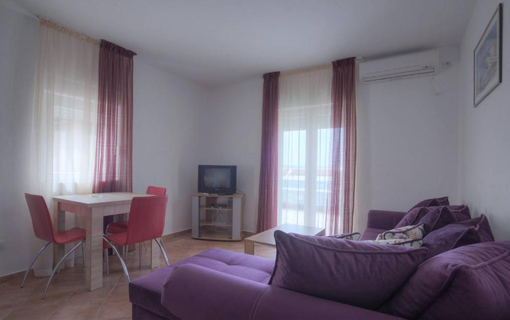 TV a/nebo společenská místnost v ubytování Apartments Đurašević