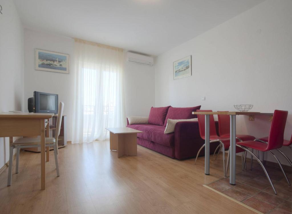 TV a/nebo společenská místnost v ubytování Apartments Đurašević
