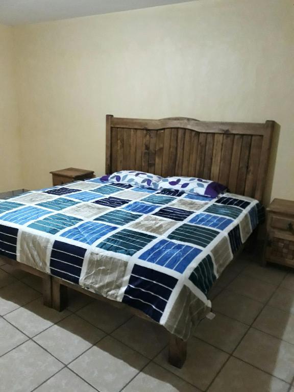 Postel nebo postele na pokoji v ubytování Hotel Villa Aurora