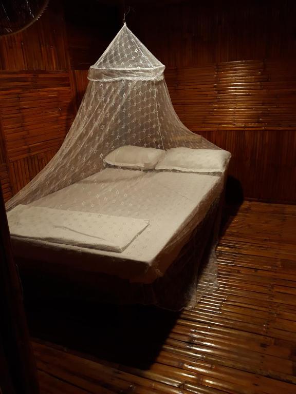 Postel nebo postele na pokoji v ubytování Magindara Guesthouse