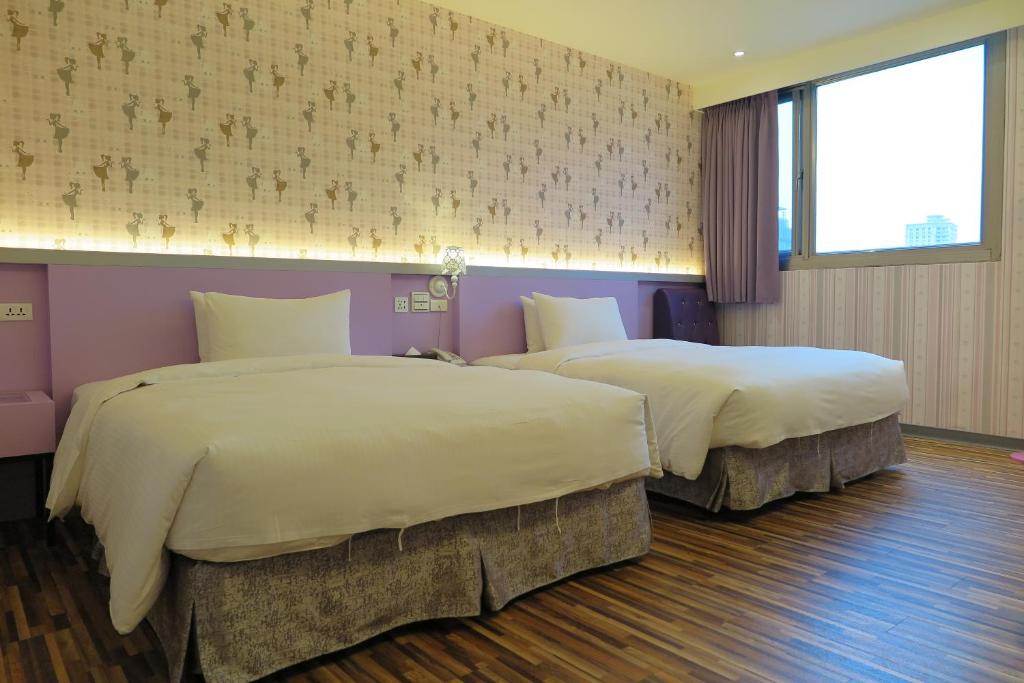Postel nebo postele na pokoji v ubytování 191 Hotel