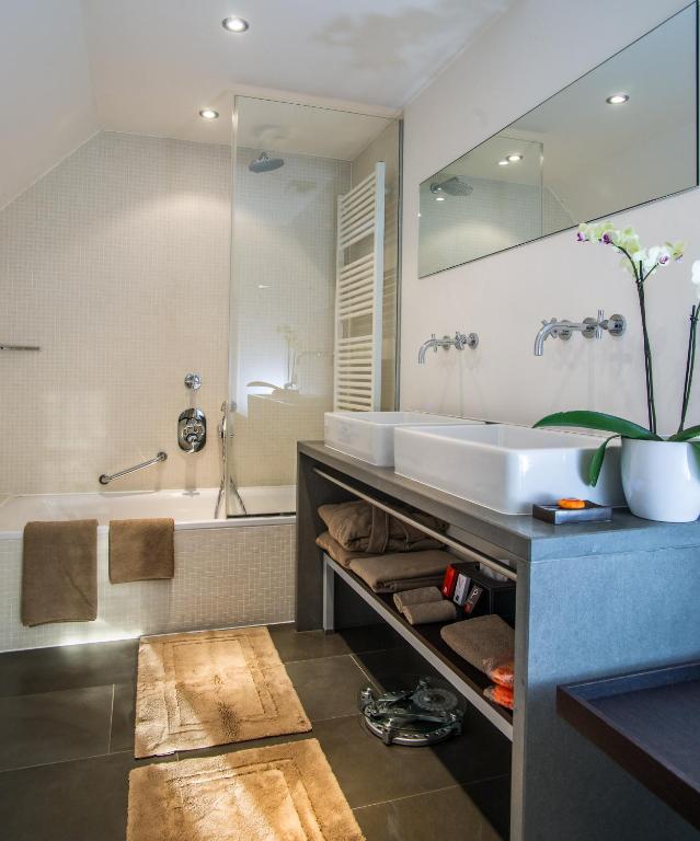 Koupelna v ubytování Hotel Alzinn