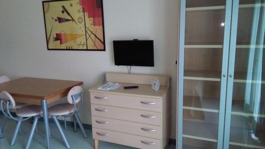 TV a/nebo společenská místnost v ubytování Hotel Minerva