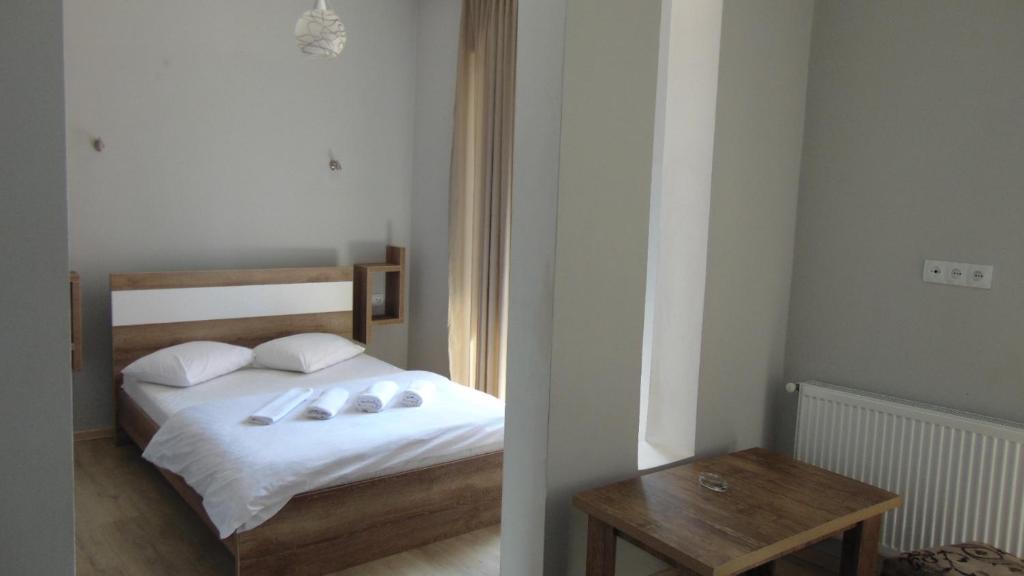 Postel nebo postele na pokoji v ubytování Old Street Guesthouse