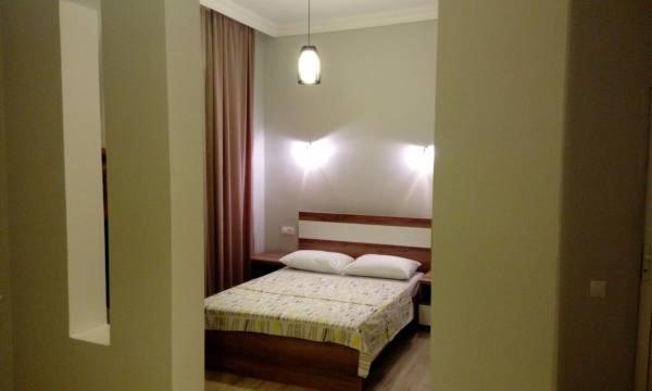 Postel nebo postele na pokoji v ubytování Old Street Guesthouse