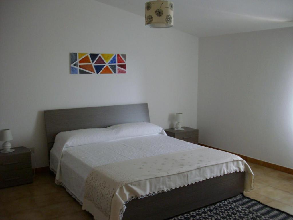 Кровать или кровати в номере Casa Di Paola - AIR CONDITIONING