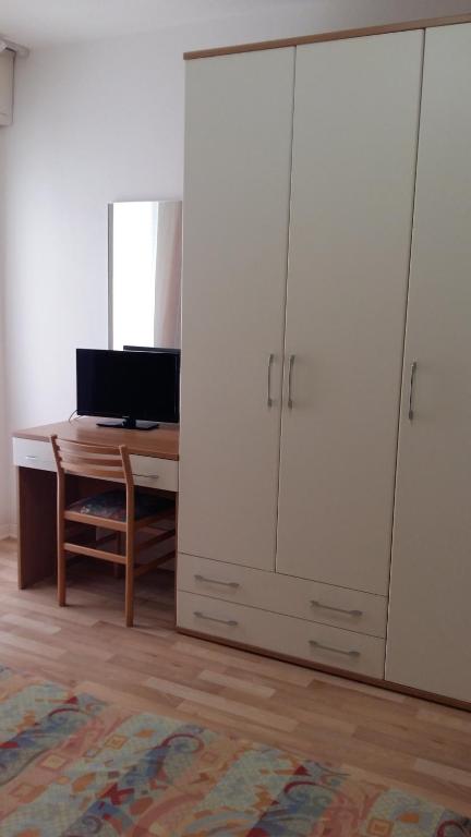 TV a/nebo společenská místnost v ubytování Hotel Augusta