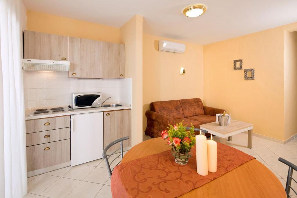 Kuchyň nebo kuchyňský kout v ubytování Apartments Amfora Plava Laguna