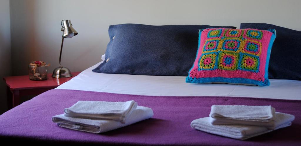 Ένα ή περισσότερα κρεβάτια σε δωμάτιο στο La Cambicha Ranchos