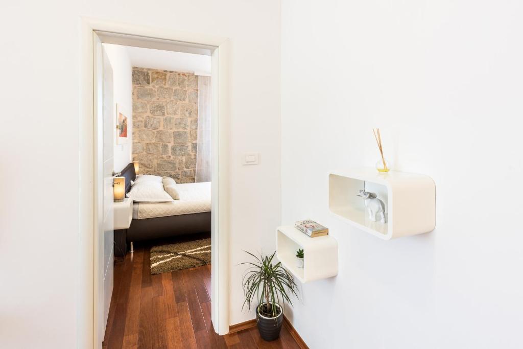 Posteľ alebo postele v izbe v ubytovaní Fairy Of The Seas Apartments