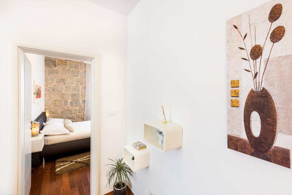 Posteľ alebo postele v izbe v ubytovaní Fairy Of The Seas Apartments