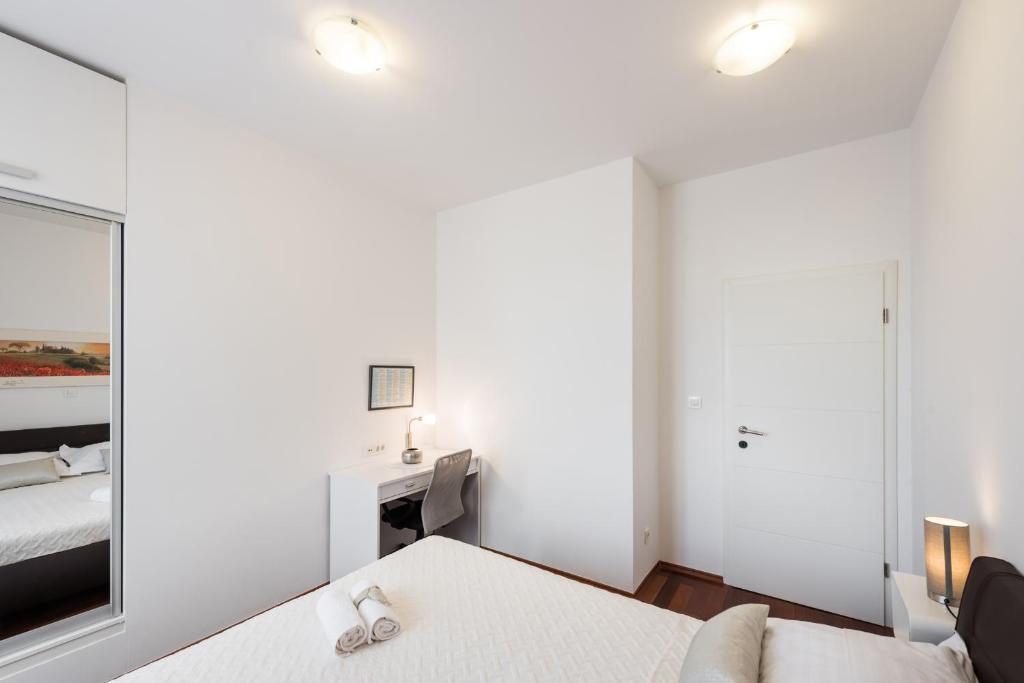 Posteľ alebo postele v izbe v ubytovaní Fairy Of The Seas Apartments