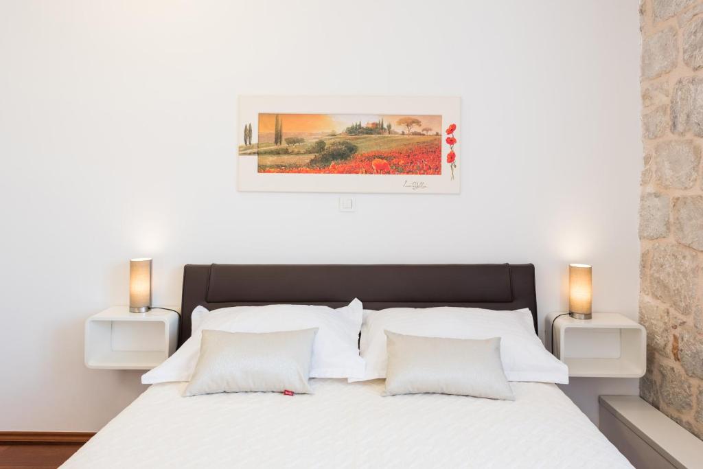 Posteľ alebo postele v izbe v ubytovaní Fairy Of The Seas Apartments