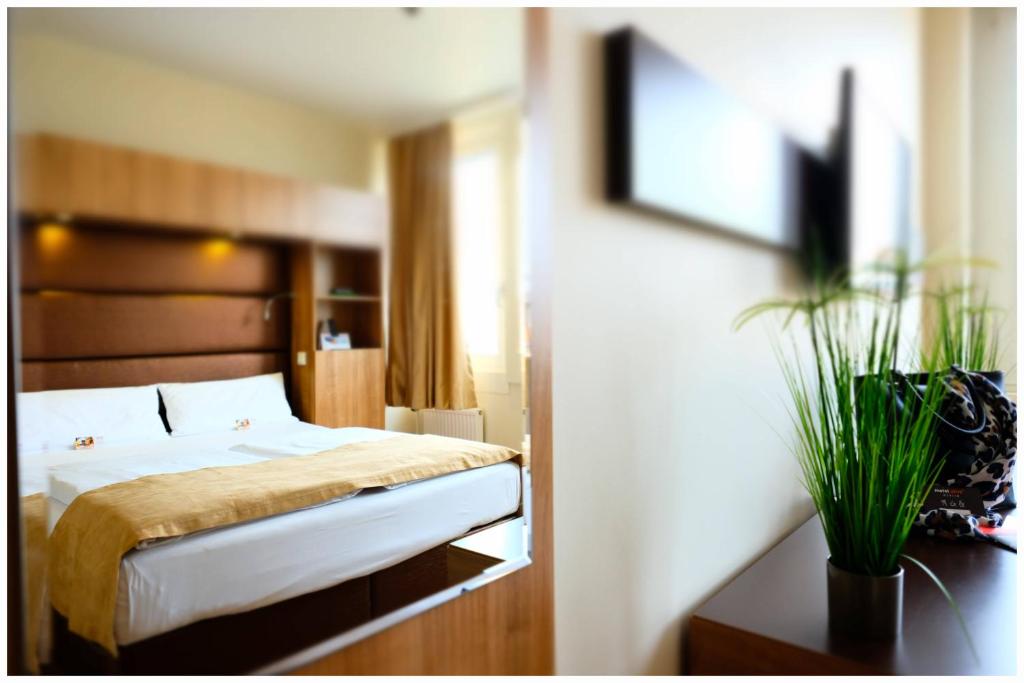 TV a/nebo společenská místnost v ubytování Motel Plus Berlin