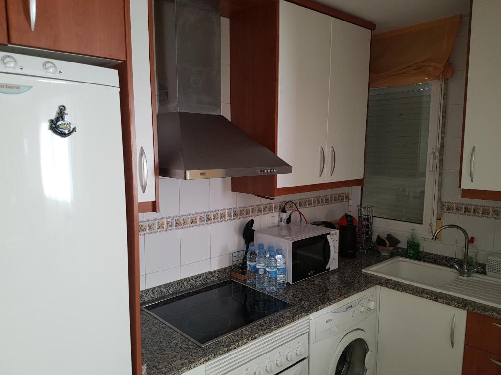 Kuchyň nebo kuchyňský kout v ubytování Vera Rental Torremar Natura