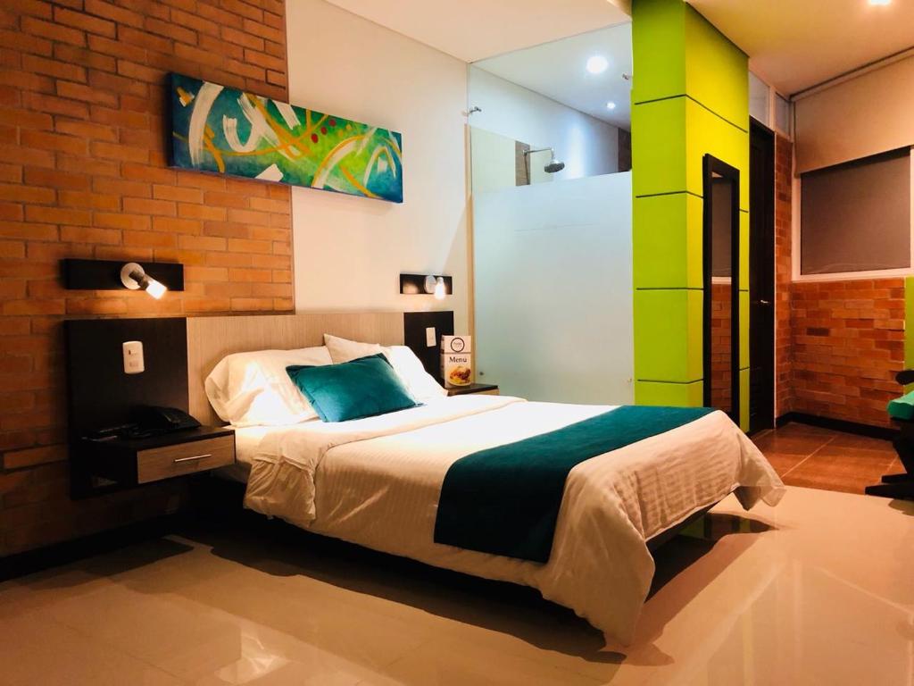 Postel nebo postele na pokoji v ubytování Hotel Toscana Oriente