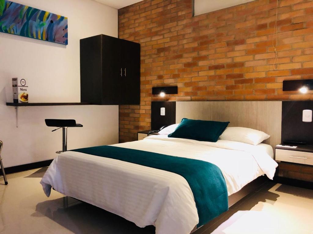Postel nebo postele na pokoji v ubytování Hotel Toscana Oriente