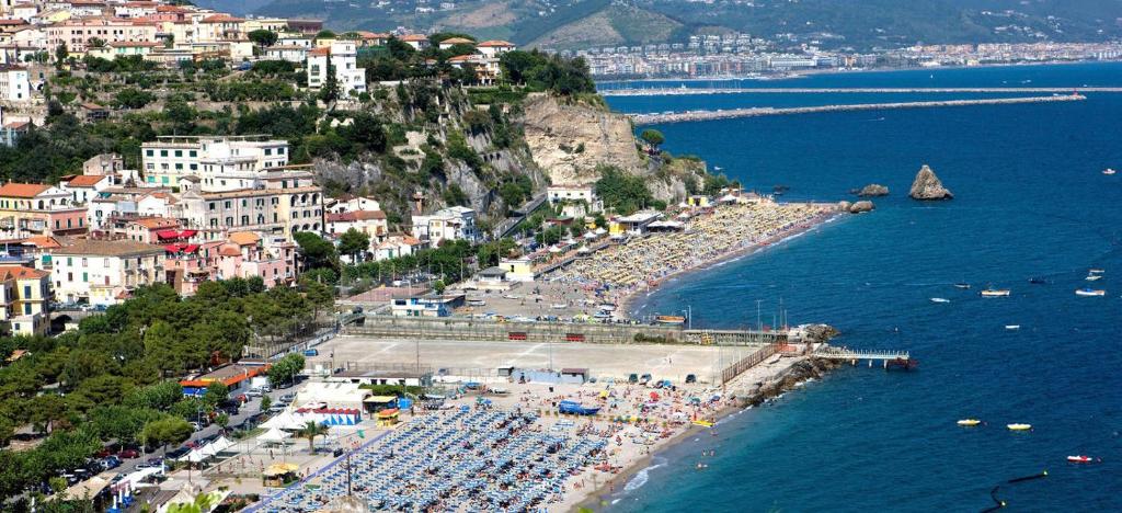 an aerial view of a beach with a crowd of people at Villa Angelina in Vietri sul Mare