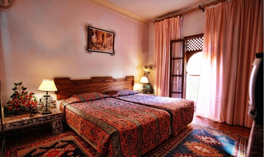 Postel nebo postele na pokoji v ubytování Hotel Club Hanane