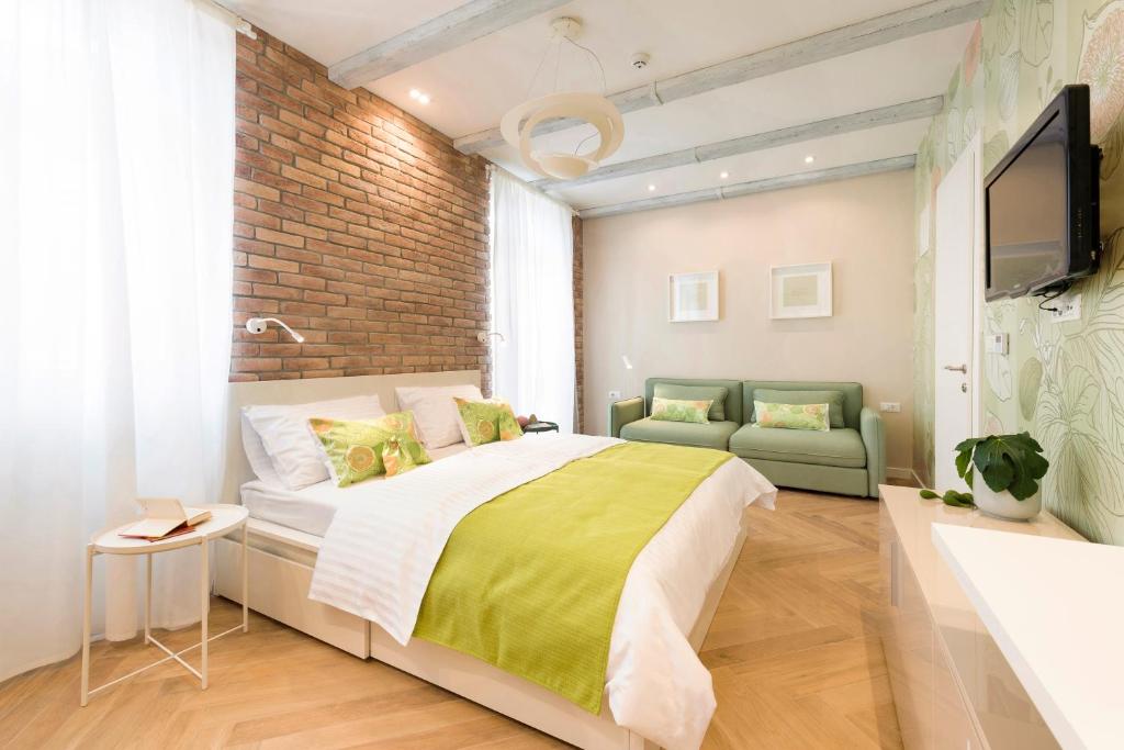 Postel nebo postele na pokoji v ubytování Mak Luxury Rooms
