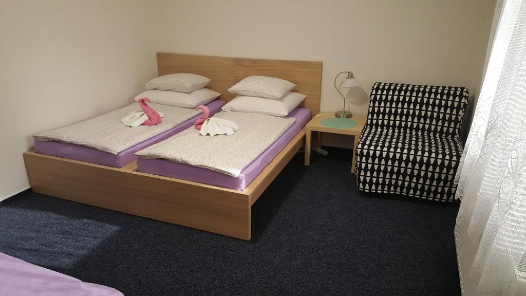 Postel nebo postele na pokoji v ubytování Ubytování Němčičky