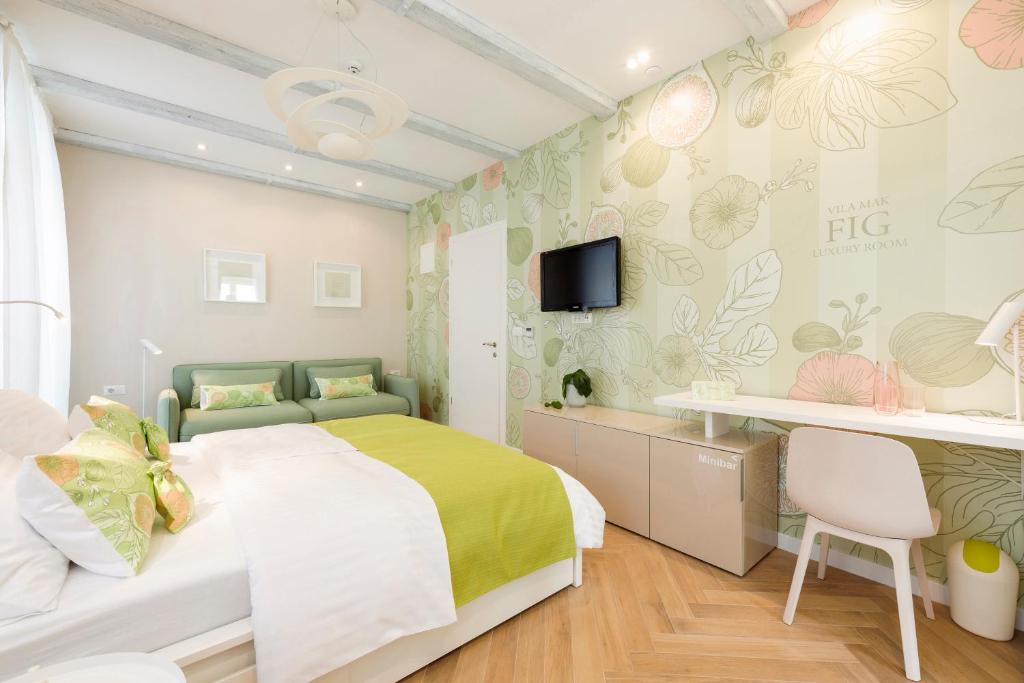 Postel nebo postele na pokoji v ubytování Mak Luxury Rooms