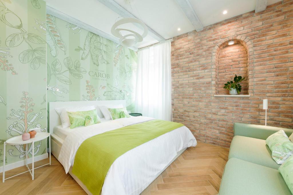 Postel nebo postele na pokoji v ubytování Mak Luxury Rooms