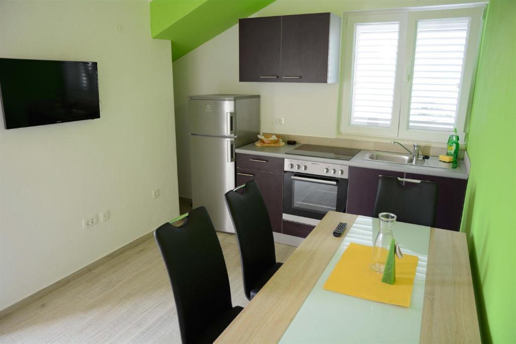 Kuchyňa alebo kuchynka v ubytovaní Apartments Dubas