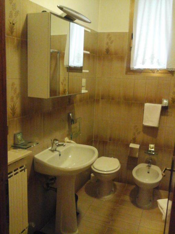 Koupelna v ubytování Casa Zia Adry