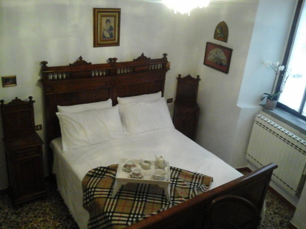 Postel nebo postele na pokoji v ubytování Casa Zia Adry