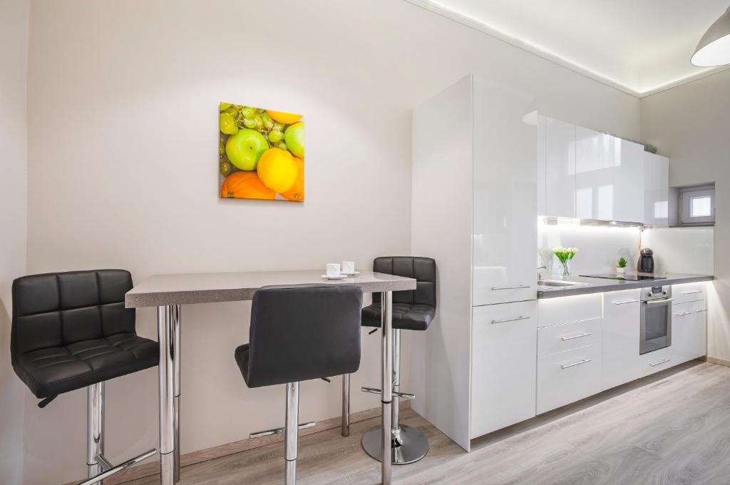 Kuchyňa alebo kuchynka v ubytovaní Kings Cross Apartment