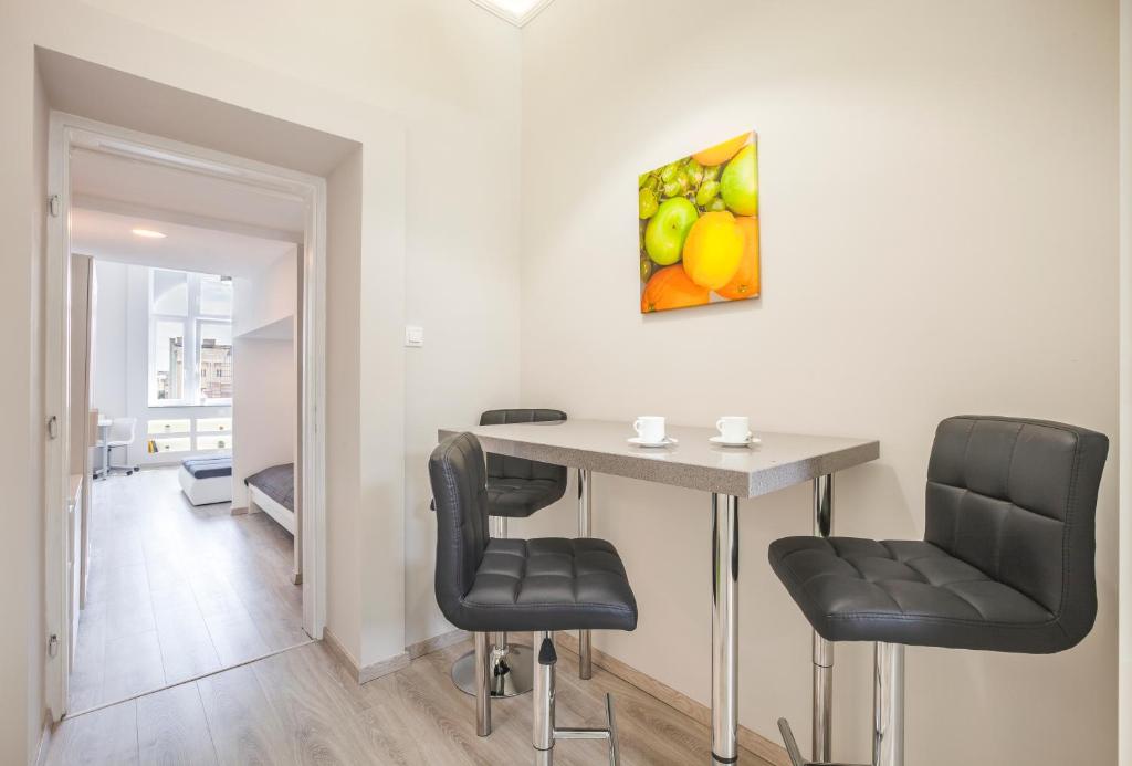 Posedenie v ubytovaní Kings Cross Apartment