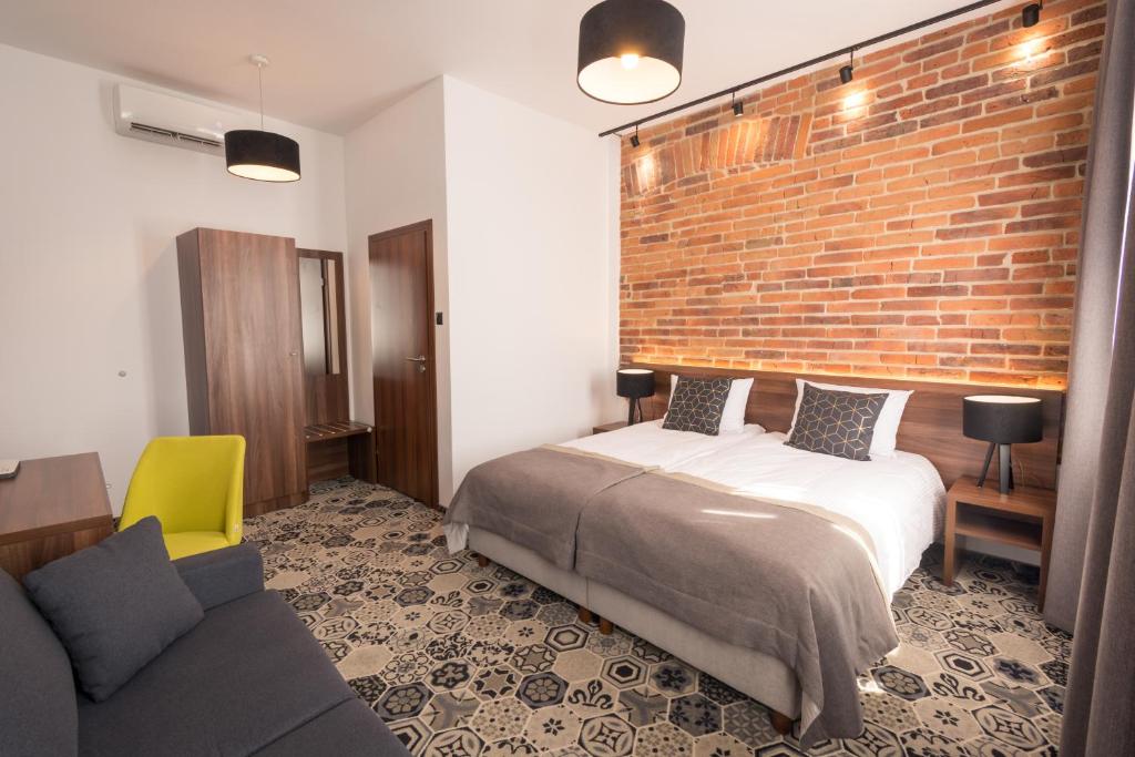 Posteľ alebo postele v izbe v ubytovaní Hotel Lavender