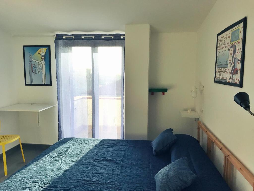 Letto o letti in una camera di Accomodation Libertino