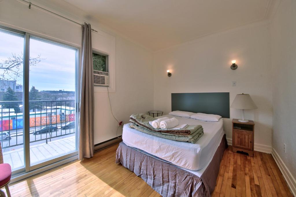 Postel nebo postele na pokoji v ubytování Hotel Mini Inc