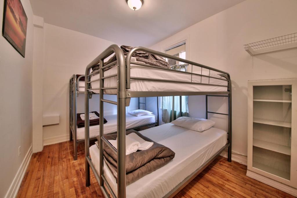 Postel nebo postele na pokoji v ubytování Hotel Mini Inc