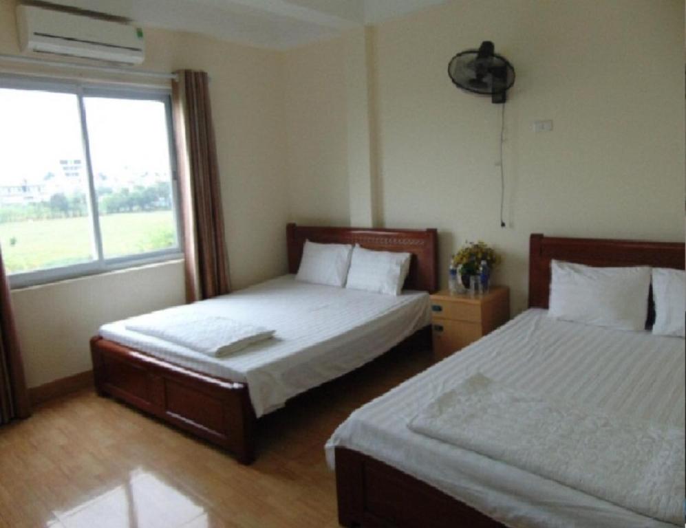 Viet Anh 123 tesisinde bir odada yatak veya yataklar