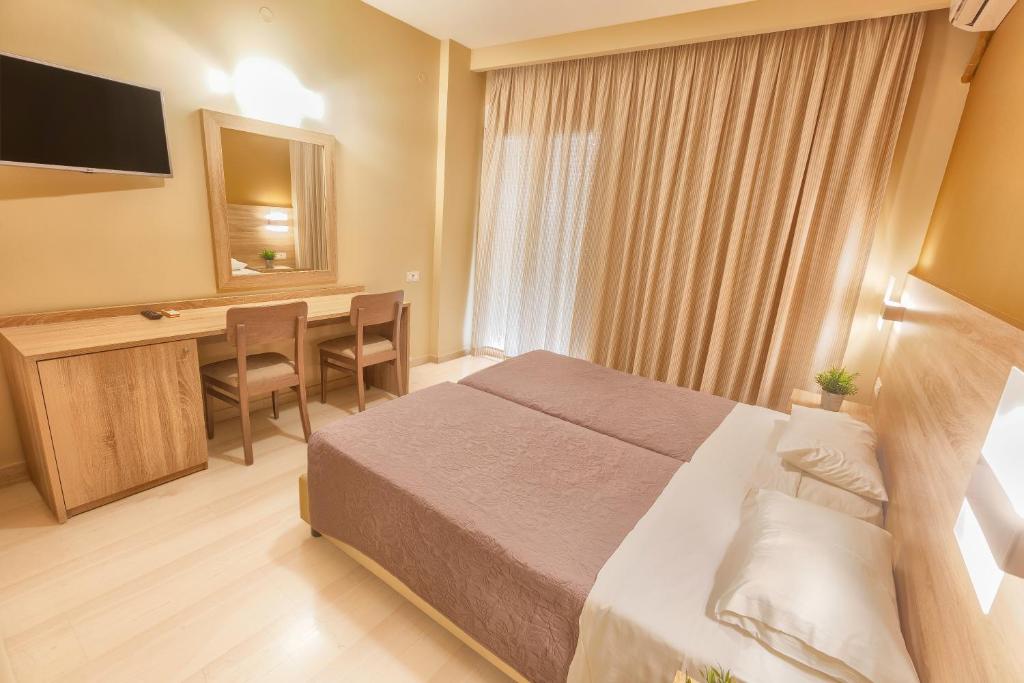Postel nebo postele na pokoji v ubytování Sofia Hotel